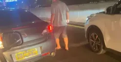 Viral Video Pengemudi Mobil Dinas Polisi Todongkan Pistol ke Sopir Taksi, Gara-gara Mobil Disalip
