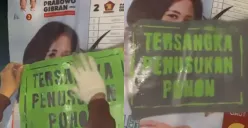 Viral Baliho Caleg yang Dipasang di Pohon Dilabeli Tersangka Penusukan Pohon, Netizen: Belum Apa-apa Udah Melanggar