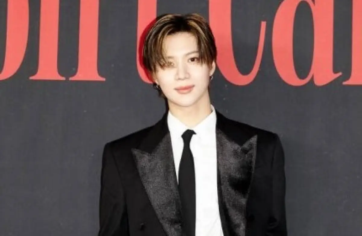 Anggota SHINEE, Taemin, yang baru saja menyelesaikan wajib militer. (Sumber : Newsen)