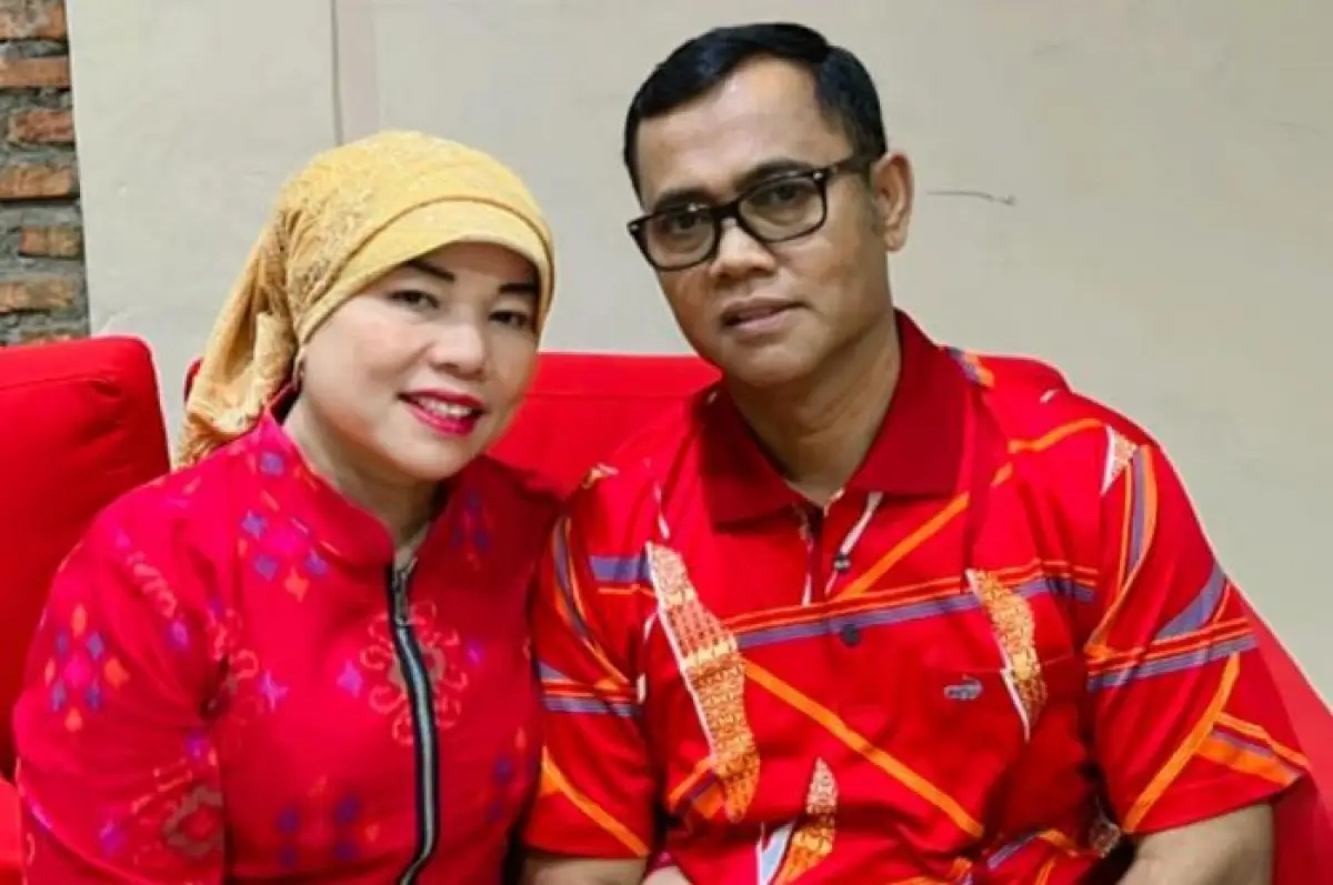 Dewi Zuhriati dan Haji Faisal