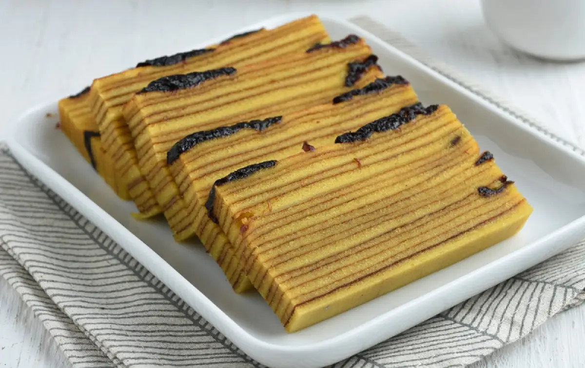 Ilustrasi Kue Lapis Legit. (Sumber : Freepik)