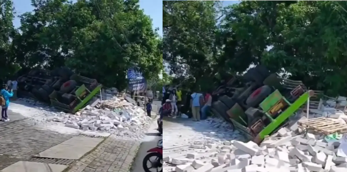 Kecelakaan tunggal di Pakintelan, Gunungpati, sebuah truk muatan hebel terguling setelah mengalami rem blong dan menabrak pohon di lahan kosong, Selasa 4 Juli 2023. (Sumber : Instagram @kejadiansmg)