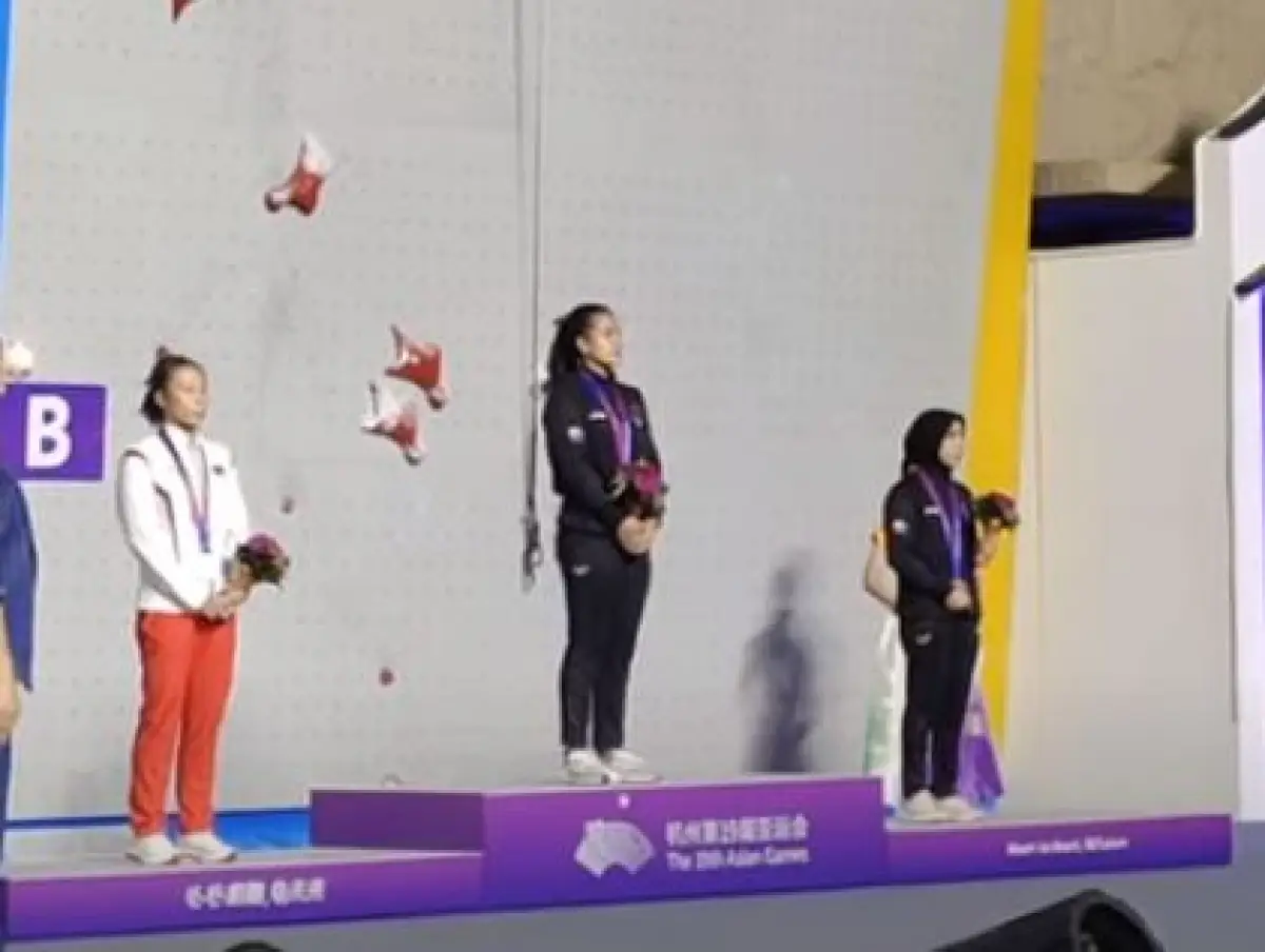 Desak Made Rita Kusuma Dewi saat di Podium Asian Games China 2022 (Sumber : kompasTV)
