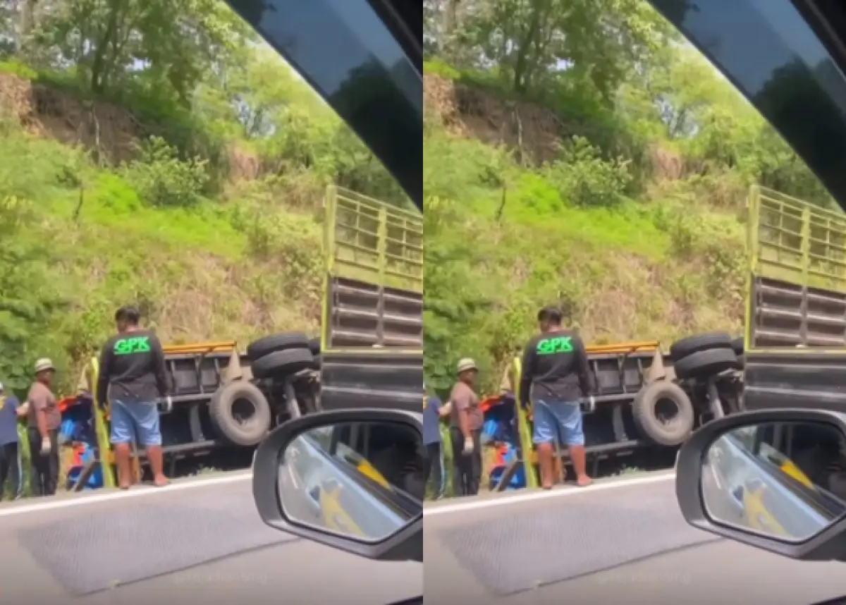 Sebuah truk nyungseb di pari saat di Jalan Tol Jatingaleh (Sumber : Instagram @kejadiansmg)