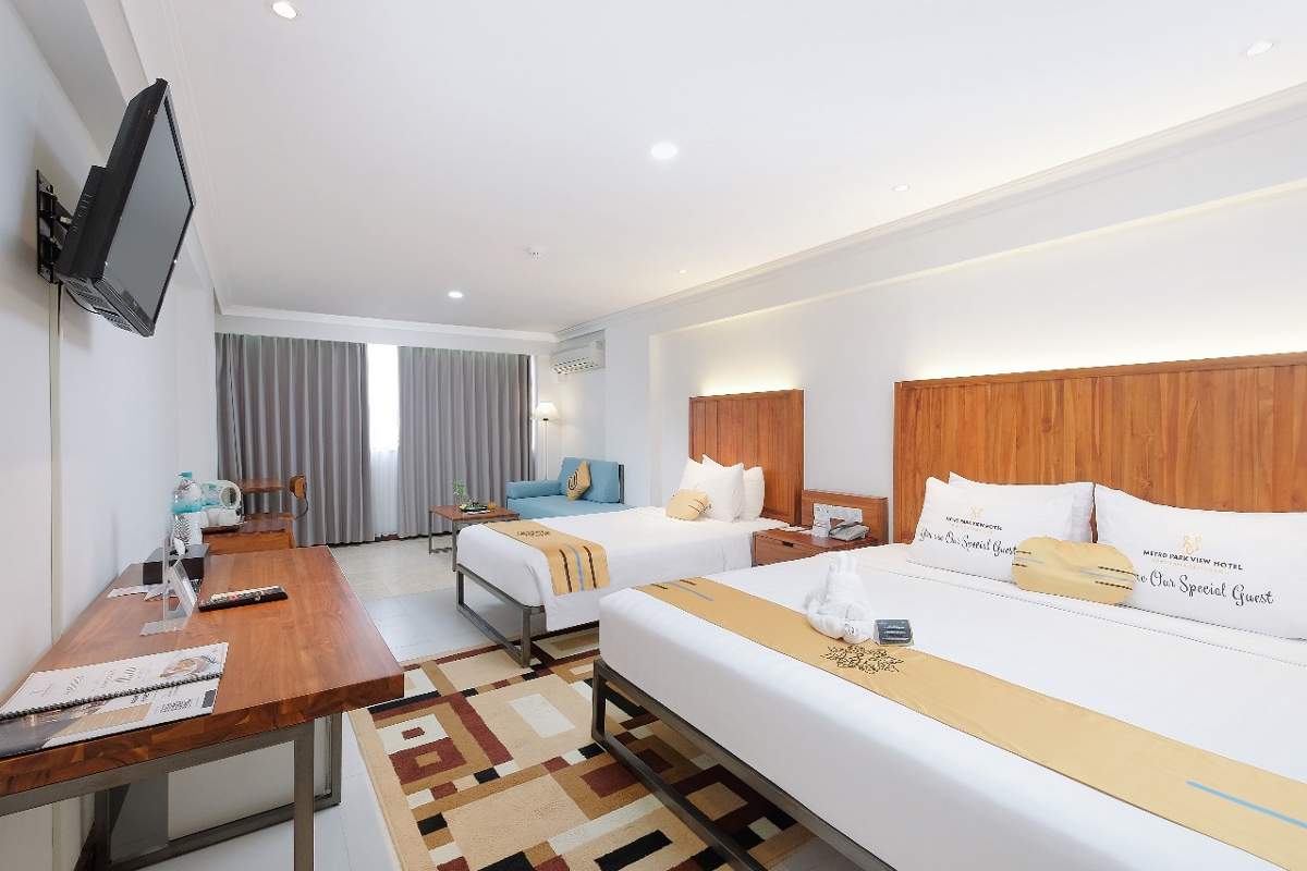 Salah satu kamar di Hotel Metro Park View Senarang.